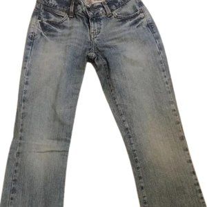Rare Women’s Wrangler jeans with pink stitch.